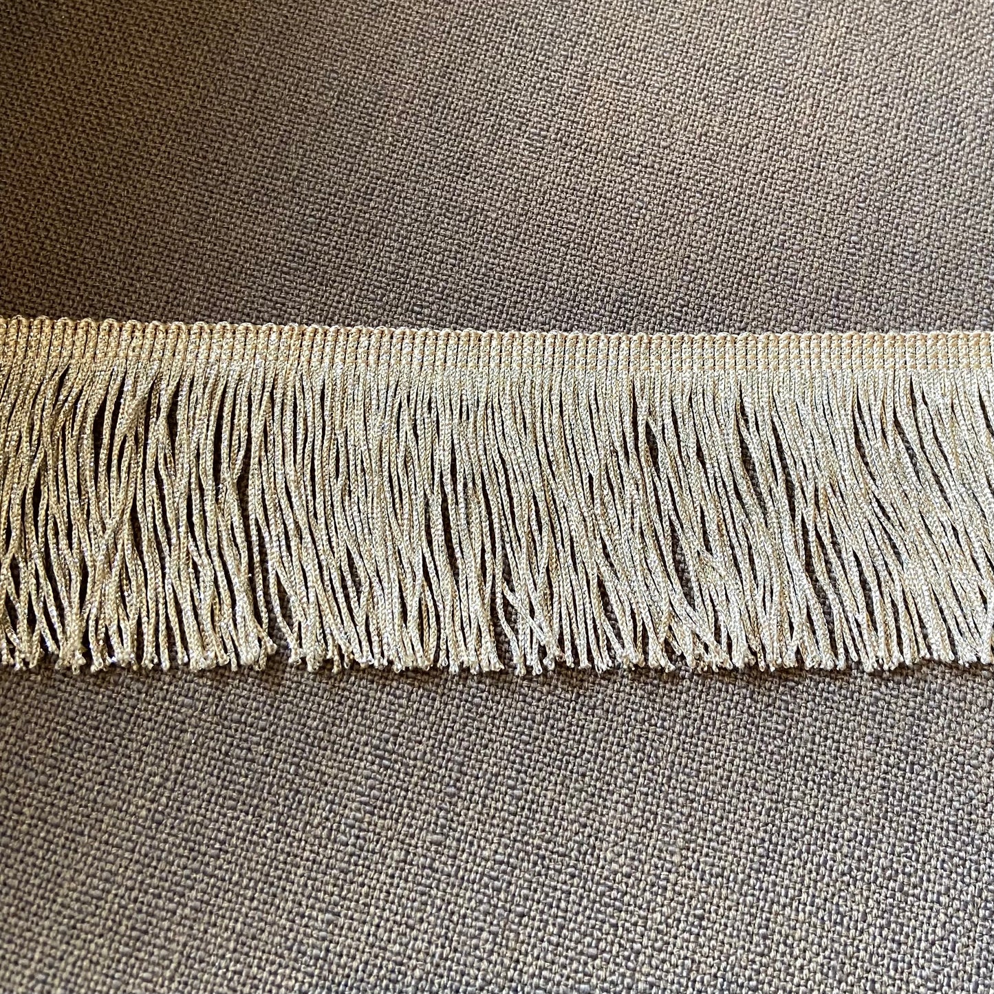 Fransen beige silber