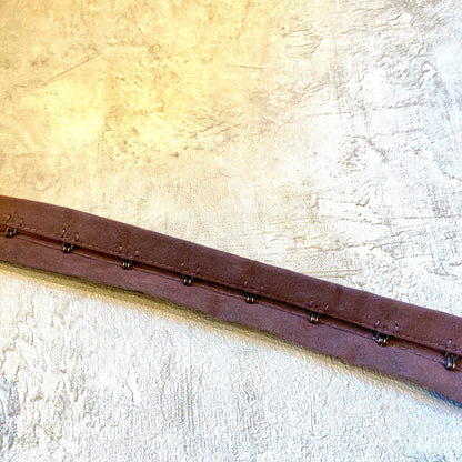 Miederband mit Oesen